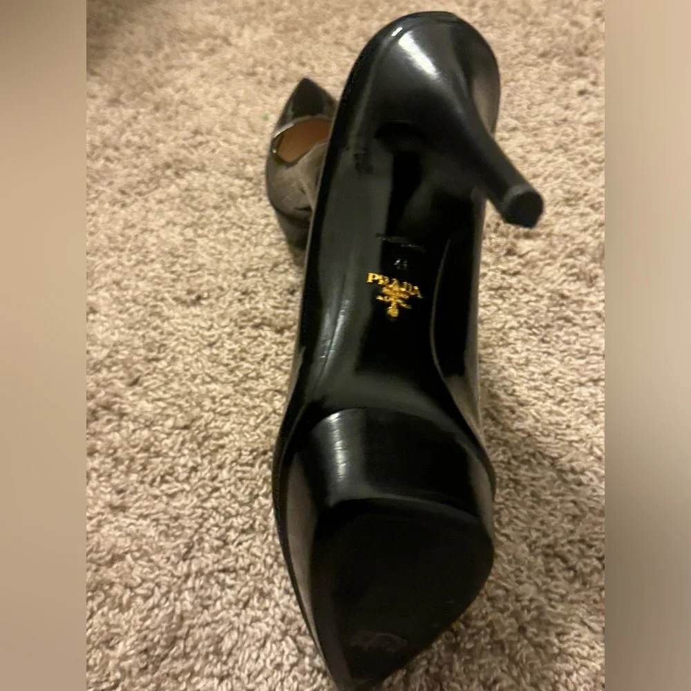 Brand new, without tags. Never worn Prada platform heels.
